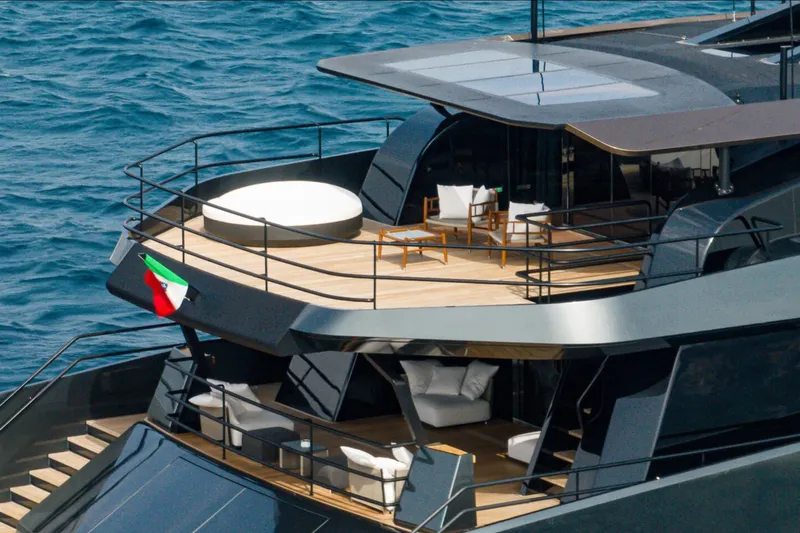  Yacht Photos Pics Luxurious Maori 125 yacht deck with seating, jacuzzi, and ocean view, 2029 model.