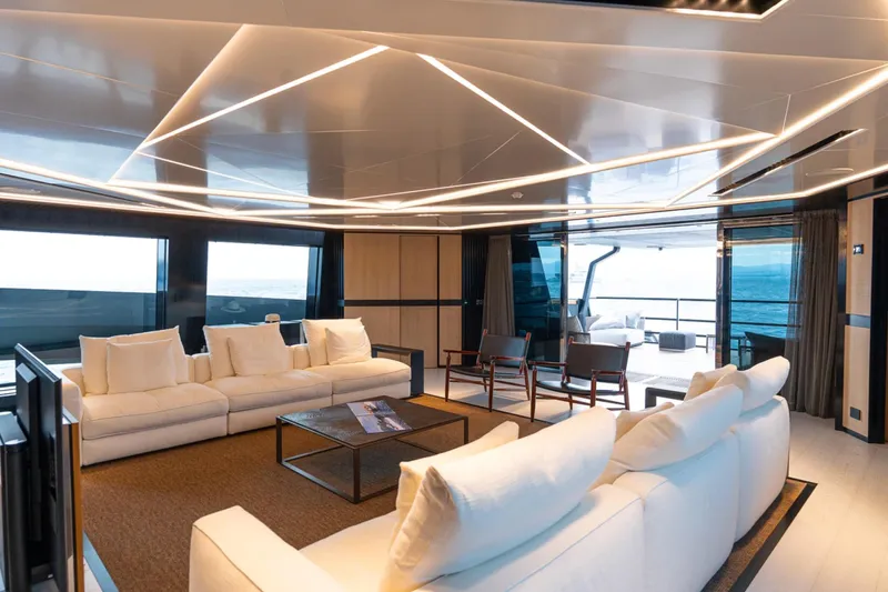  Yacht Photos Pics Luxurious interior of 2029 Maori 125 yacht with modern seating and ocean view.