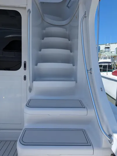 Rubia Yacht Photos Pics Staircase on 2000 Luhrs 36 Convertible yacht, leading to upper deck.