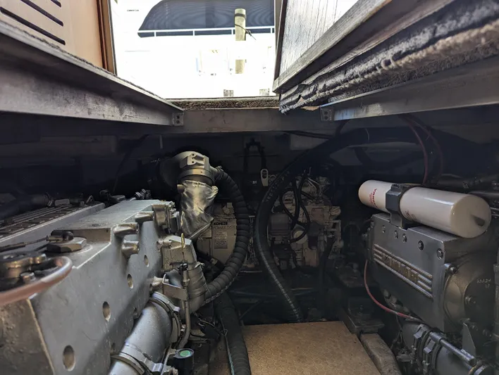 Rubia Yacht Photos Pics Engine room of 2000 Luhrs 36 Convertible boat, showcasing mechanical components.