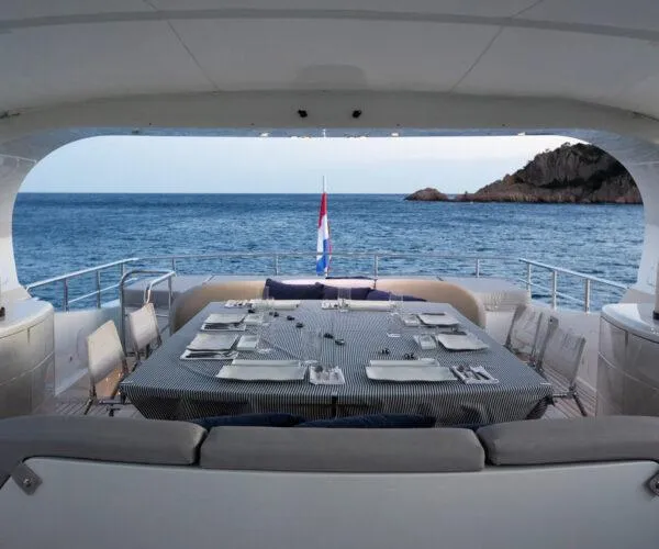  Yacht Photos Pics Luxury dining area on 2009 Maiora 31DP yacht with ocean view.