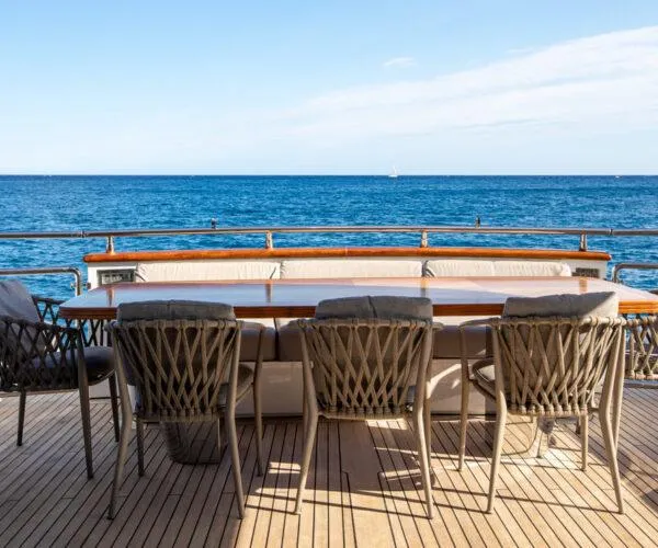  Yacht Photos Pics Luxury yacht Maiora 31DP 2009, deck view with ocean backdrop and elegant seating.