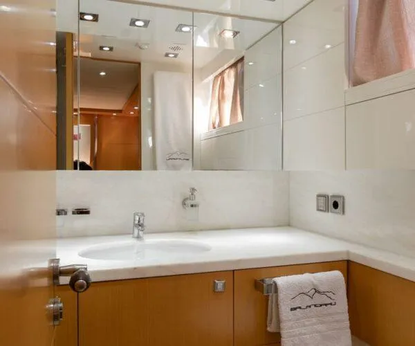  Yacht Photos Pics Luxurious bathroom in a 2009 Maiora 31DP yacht, featuring sleek design and modern fixtures.