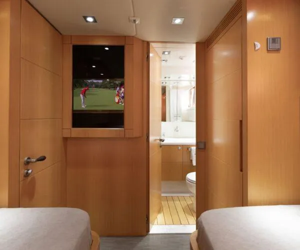  Yacht Photos Pics Luxurious 2009 Maiora 31DP yacht cabin with TV and ensuite bathroom.