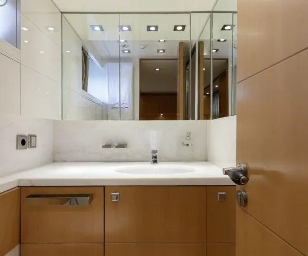  Yacht Photos Pics Luxurious bathroom interior on 2009 Maiora 31DP yacht, featuring modern fixtures and elegant design.