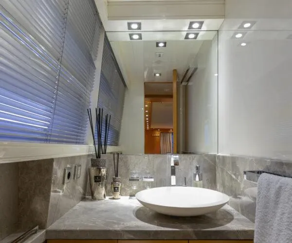  Yacht Photos Pics Luxurious bathroom in 2009 Maiora 31DP yacht with modern fixtures and elegant design.