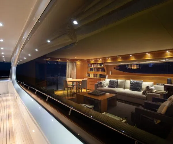  Yacht Photos Pics Luxurious interior of 2009 Maiora 31DP yacht with elegant seating and ambient lighting.