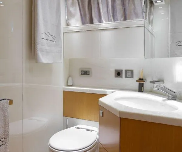  Yacht Photos Pics Luxurious bathroom in a 2009 Maiora 31DP yacht, featuring modern fixtures and elegant design.