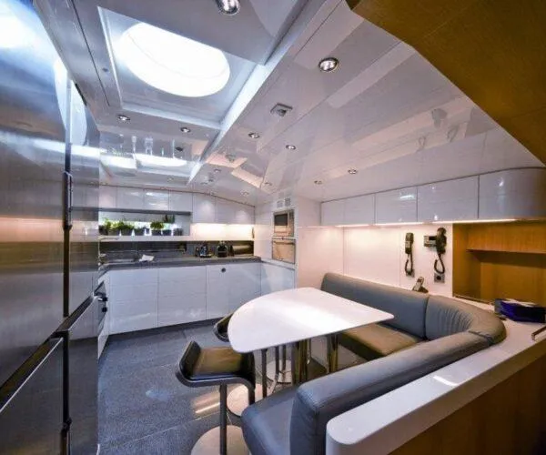  Yacht Photos Pics Luxurious Maiora 31DP yacht interior, featuring modern kitchen and dining area, 2009 model.