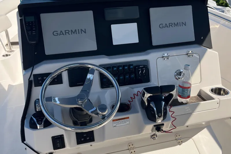  Yacht Photos Pics Control panel of a 2022 Sailfish 320 CC boat with Garmin displays.