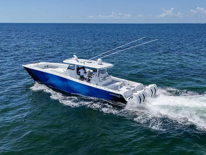  Yacht Photos Pics 2023 Freeman 47 boat cruising on open ocean waters.