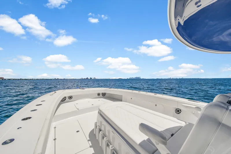  Yacht Photos Pics 2023 Freeman 47 boat on open sea under clear blue sky.
