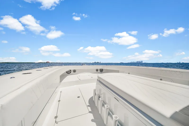  Yacht Photos Pics 2023 Freeman 47 boat on open water under a clear blue sky.