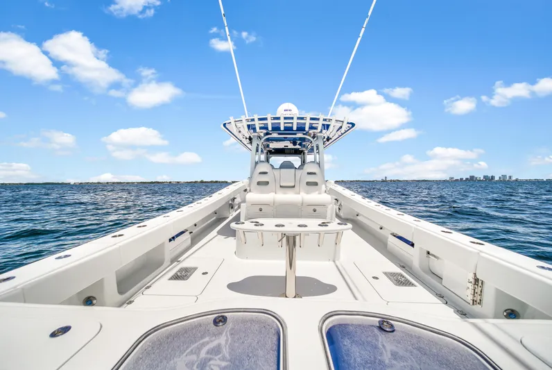  Yacht Photos Pics 2023 Freeman 47 boat on open water under clear blue sky.