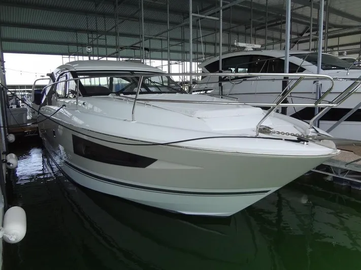 Lake Time, Austin, Tx Yacht Photos Pics 2017 Jeanneau LEADER 36 yacht docked in a covered marina.