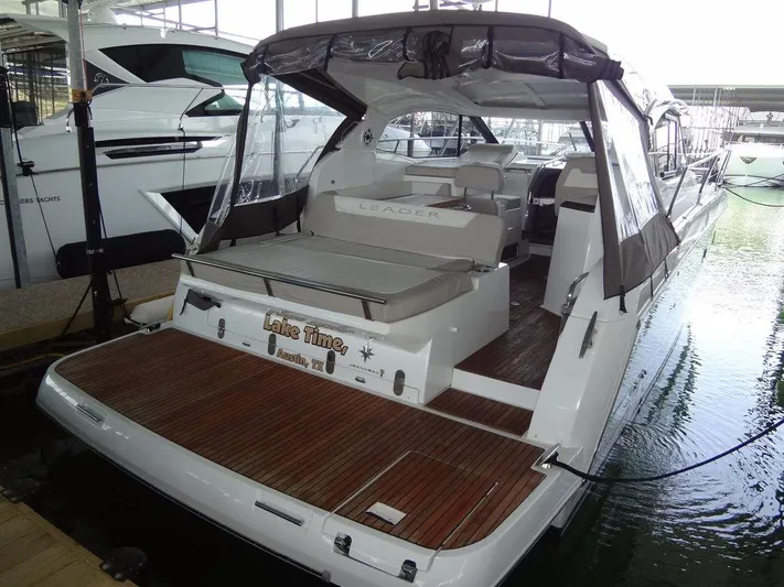 Lake Time, Austin, Tx Yacht Photos Pics 2017 Jeanneau LEADER 36 yacht with covered deck and wooden flooring in marina.