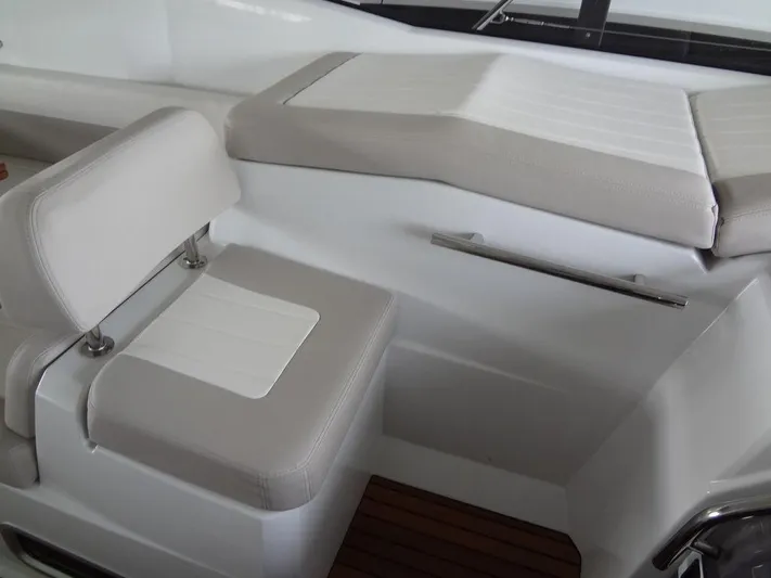 Lake Time, Austin, Tx Yacht Photos Pics Jeanneau LEADER 36 2017 boat interior seating with white and beige upholstery.