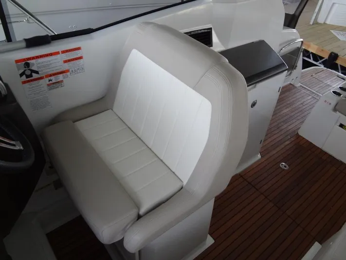 Lake Time, Austin, Tx Yacht Photos Pics 2017 Jeanneau LEADER 36 interior with white seating and wooden flooring.