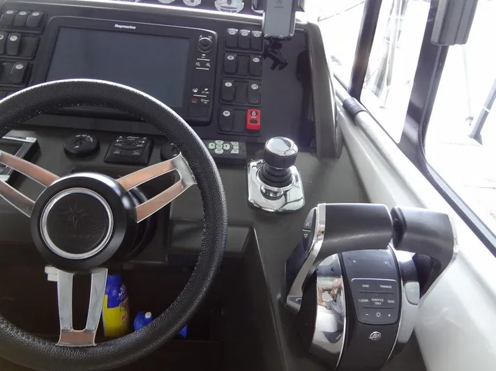 Lake Time, Austin, Tx Yacht Photos Pics 2017 Jeanneau LEADER 36 helm with steering wheel and control panel.