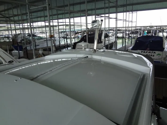 Lake Time, Austin, Tx Yacht Photos Pics 2017 Jeanneau LEADER 36 yacht docked in a marina under a covered structure.