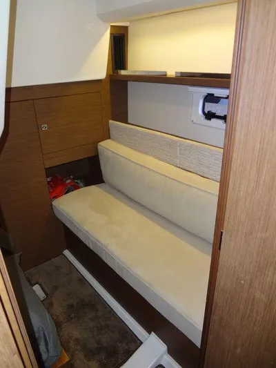 Lake Time, Austin, Tx Yacht Photos Pics 2017 Jeanneau Leader 36 cabin interior with beige seating and wooden accents.