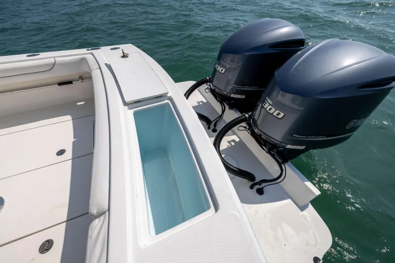 Yacht Photos Pics 2018 Albemarle 27 Express boat with twin outboard engines on open water.