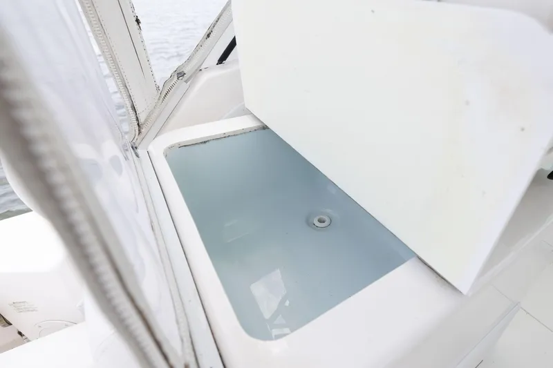  Yacht Photos Pics Livewell on 2018 Albemarle 27 Express boat, open lid, white interior.