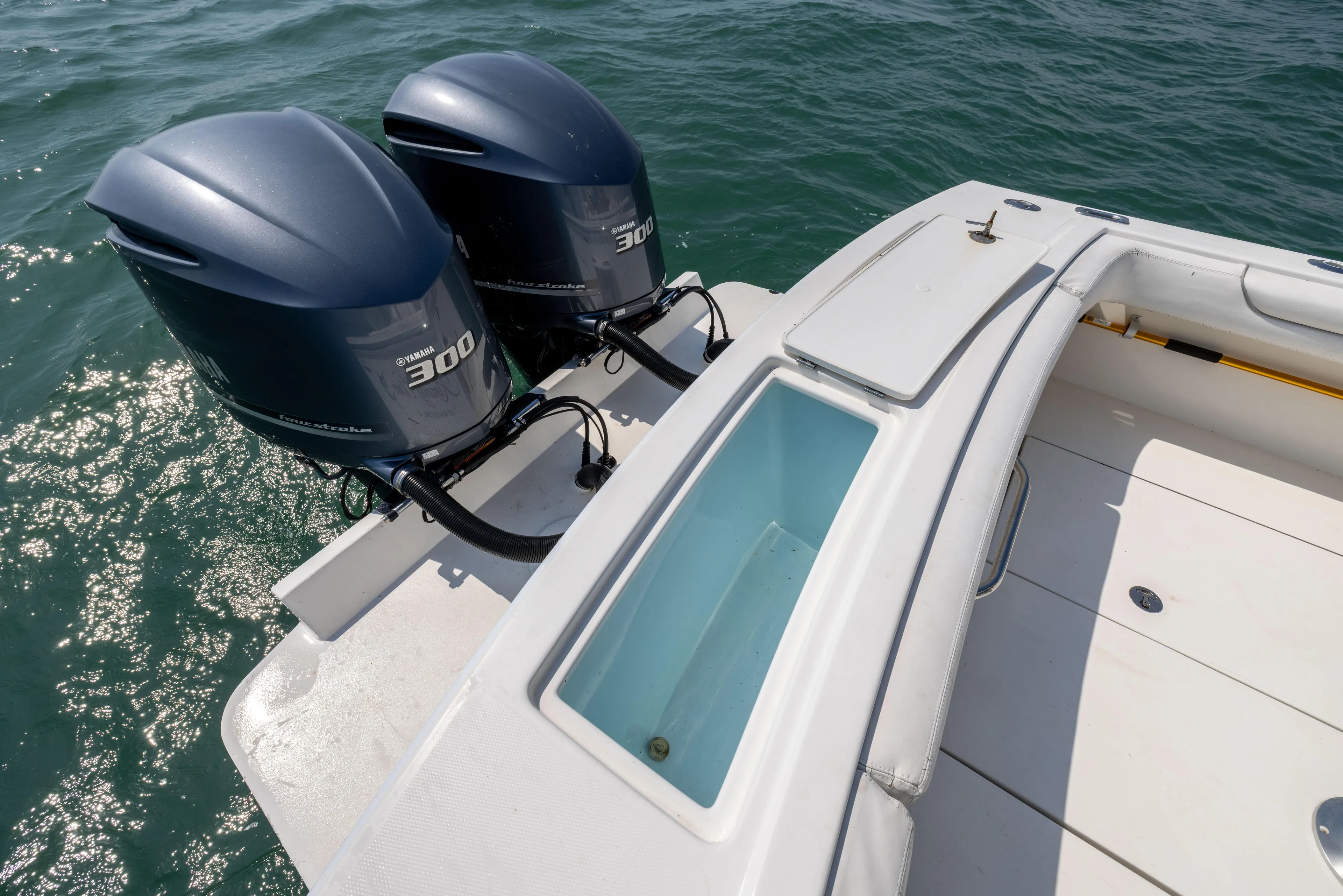  Yacht Photos Pics 2018 Albemarle 27 Express boat with twin outboard engines on the water.