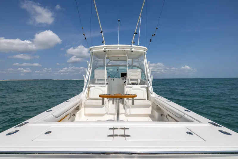  Yacht Photos Pics 2018 Albemarle 27 Express boat on open water under blue sky.