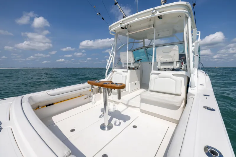  Yacht Photos Pics 2018 Albemarle 27 Express boat on open water, featuring spacious deck and seating.