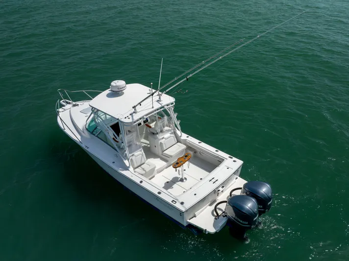  Yacht Photos Pics 2018 Albemarle 27 Express boat on open water with dual engines.