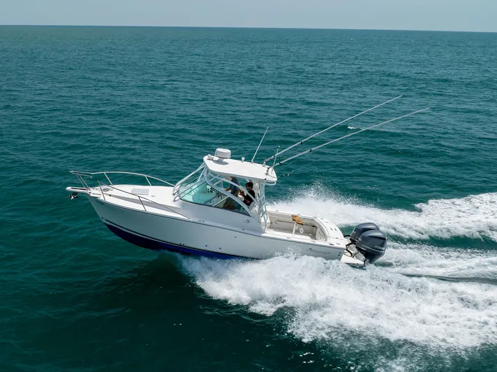  Yacht Photos Pics 2018 Albemarle 27 Express boat cruising on open sea with dual engines.