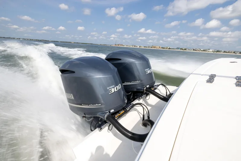  Yacht Photos Pics 2018 Albemarle 27 Express boat with twin Yamaha 300 engines cruising on open water.