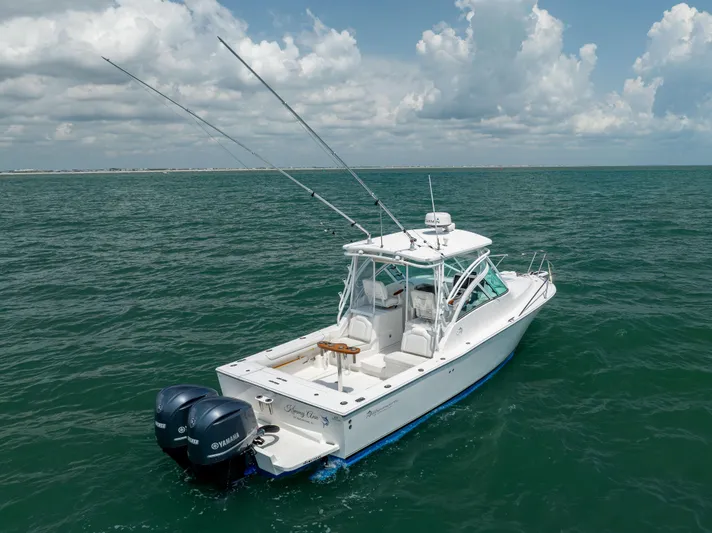  Yacht Photos Pics 2018 Albemarle 27 Express boat on open water under cloudy sky.