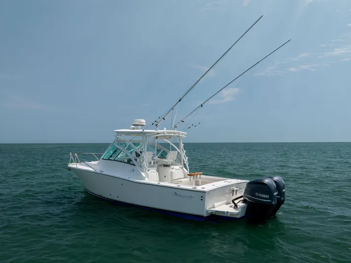  Yacht Photos Pics 2018 Albemarle 27 Express boat on open water with fishing rods.