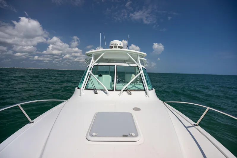  Yacht Photos Pics 2018 Albemarle 27 Express boat on open sea under clear blue sky.