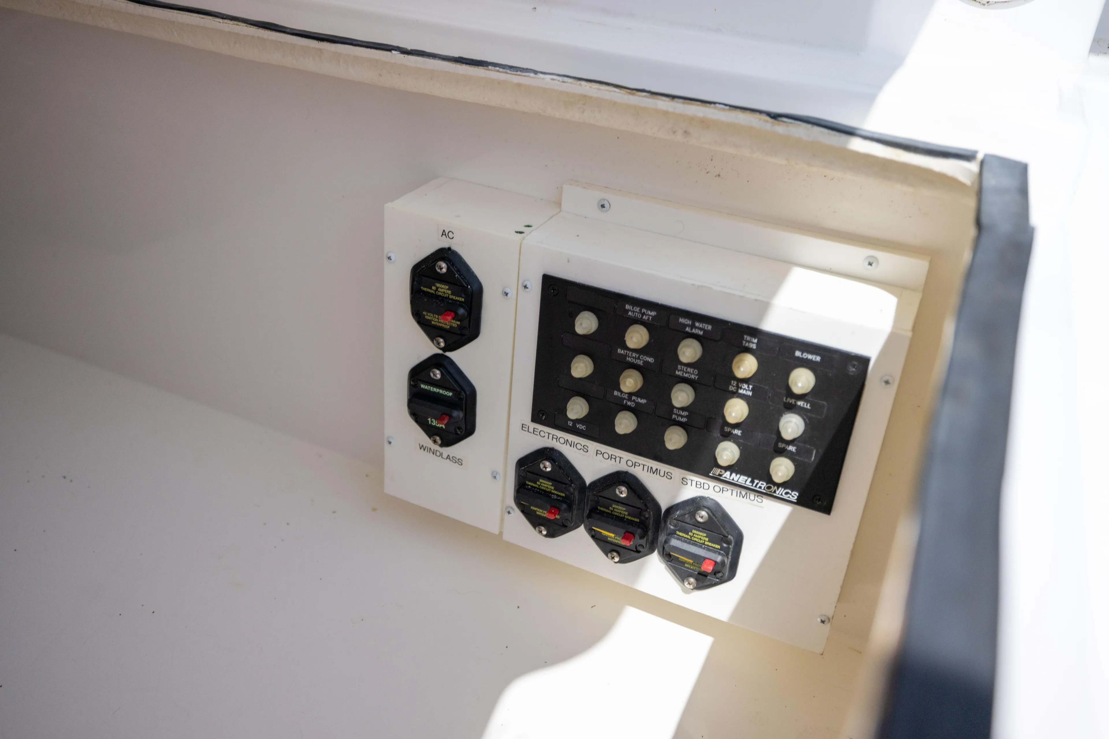  Yacht Photos Pics Control panel of a 2018 Albemarle 27 Express boat, featuring switches and gauges.