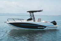 2025 Quicksilver 705 Open boat on calm water, featuring sleek design and modern features.