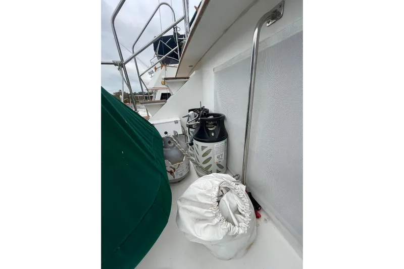 Amazing Grace Yacht Photos Pics 1983 Grand Banks 49 Classic deck with propane tank and storage bags.