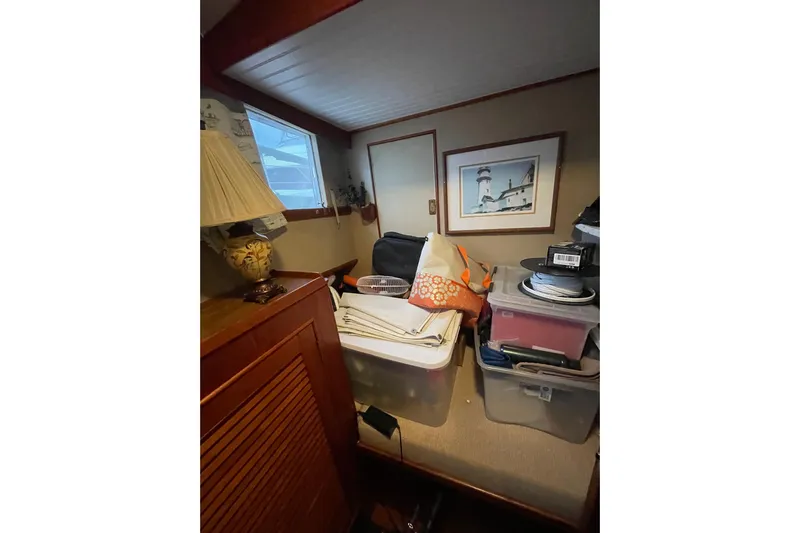 Amazing Grace Yacht Photos Pics Interior of 1983 Grand Banks 49 Classic with storage boxes and nautical decor.