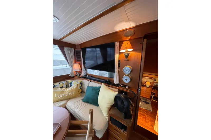 Amazing Grace Yacht Photos Pics Interior of 1983 Grand Banks 49 Classic yacht with cozy seating and nautical decor.