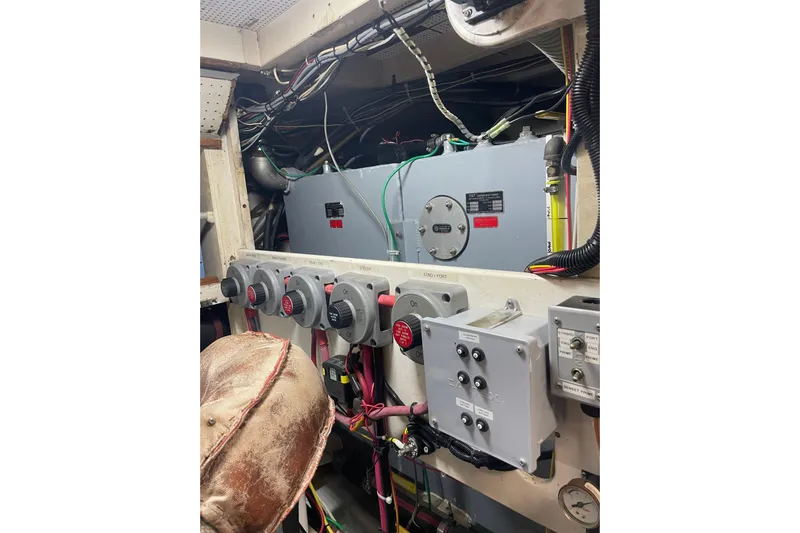 Amazing Grace Yacht Photos Pics Engine room of 1983 Grand Banks 49 Classic with electrical panels and wiring.