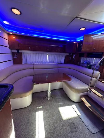 Zincohvid Yacht Photos Pics Luxurious interior of 2008 Four Winns V458 yacht with blue LED lighting and plush seating.