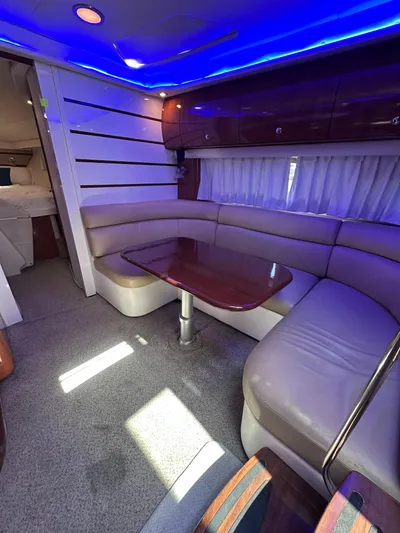 Zincohvid Yacht Photos Pics Luxurious 2008 Four Winns V458 yacht interior with blue LED lighting and plush seating.