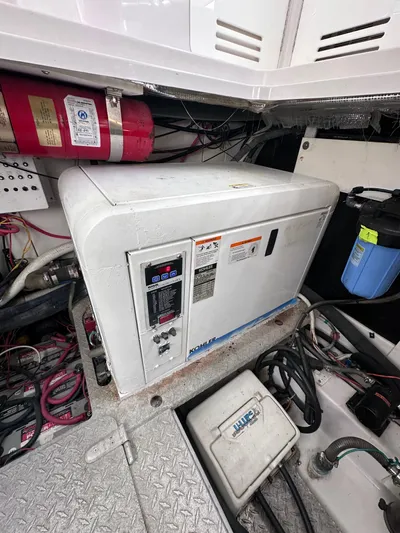 Zincohvid Yacht Photos Pics Engine room of 2008 Four Winns V458 with Kohler generator and fire extinguisher.