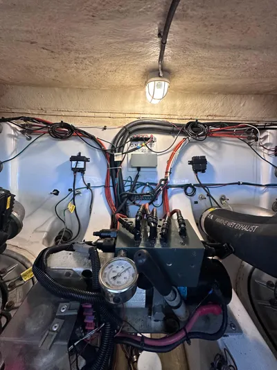 Zincohvid Yacht Photos Pics Engine room of 2008 Four Winns V458 boat with wiring and mechanical components.