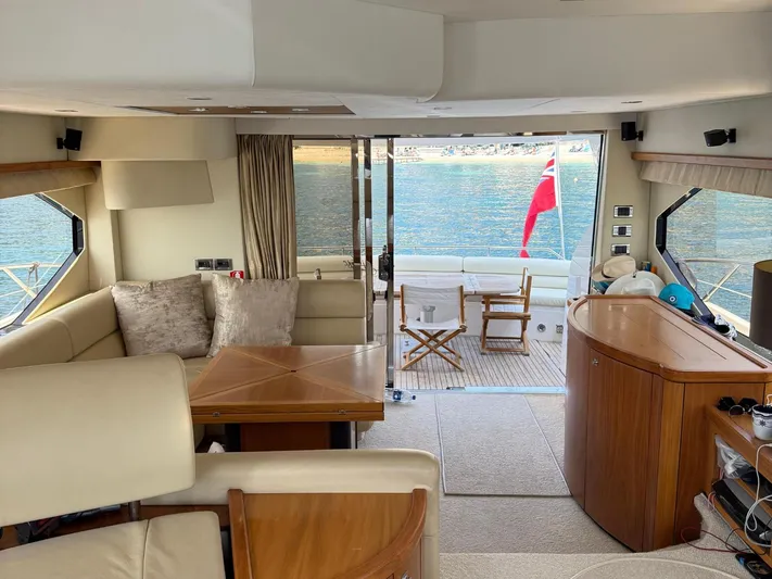  Yacht Photos Pics Luxurious interior of 2008 Sunseeker Manhattan 60 yacht with elegant seating and scenic water view.