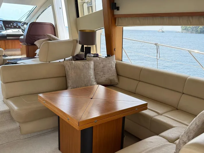  Yacht Photos Pics Luxurious interior of 2008 Sunseeker Manhattan 60 yacht with elegant seating and sea view.