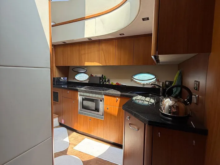  Yacht Photos Pics Luxurious kitchen interior of 2008 Sunseeker Manhattan 60 yacht with modern appliances.