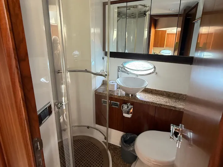  Yacht Photos Pics Luxurious bathroom in 2008 Sunseeker Manhattan 60 yacht with modern fixtures and elegant design.